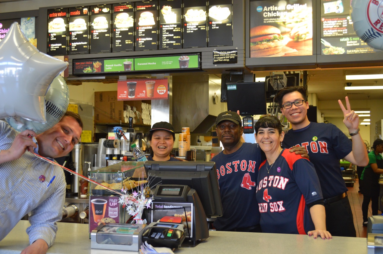 Huzzah! I walk into McDonald's to buy the busker a bottle of water, and these smiling folks are celebrating Opening Day. McDonald's doesn't dress up like this for every Red Sox game, and the employees are jovial and even the manager pokes his head to join in the excitement of Opening Day. This is what felt like the most detailed, when even in the work place everyone's spirits are lifted. 